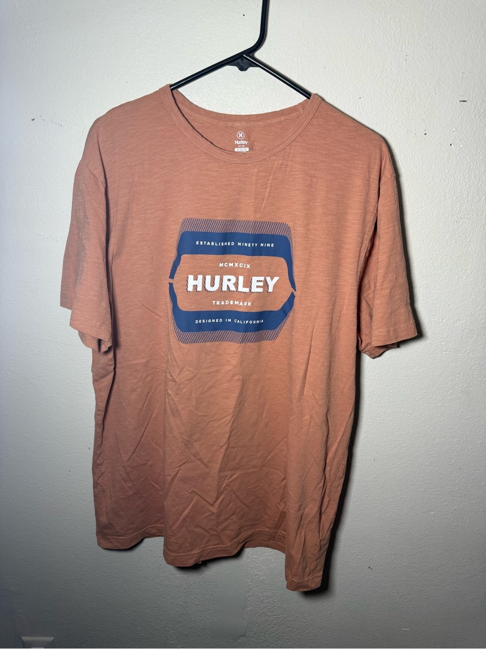 Hurley Men’s Short Sleeve Graphic Tee in Rust Orange with Navy Logo